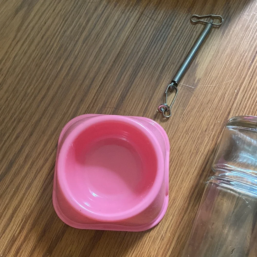 Hamster hut, water bottle, and food bowl